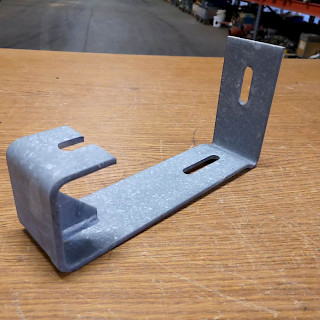 Kuljetinrullan Paluukiinnike