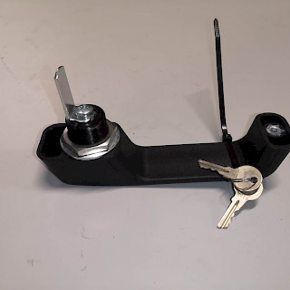 Työkoneen lukollinen kahva